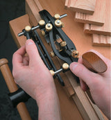 Veritas Combination Plane being used to plane a piece of wood