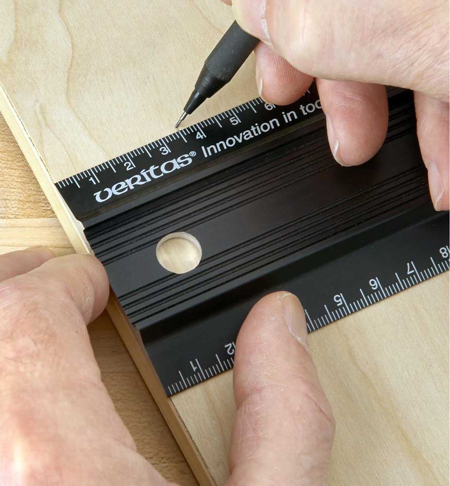 Woodworker marking workpiece with the Veritas Shop Rule 