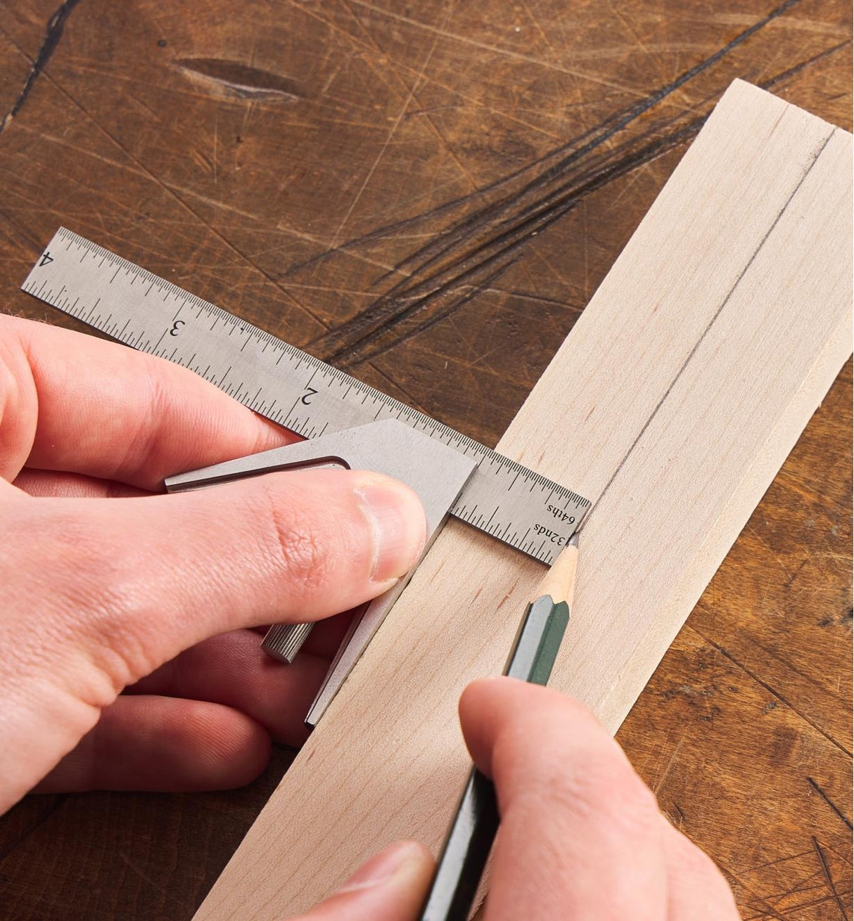 Line being marked onto a piece of wood using the Lee Valley Combination Square 4"