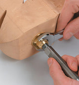 Veritas Carvers Screw being secured to carving.