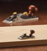 Veritas Miniature Cabinetmaker's Trimming Plane with the full size plane in the background